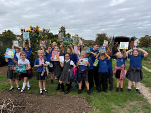 LOCAL SCHOOL CHILDREN AND RETIREES SHARE THEIR FAVOURITE BOOKS DURING AN AFTERNOON TO CELEBRATE GRANDPARENTS DAY IN STOW-ON-THE-WOLD